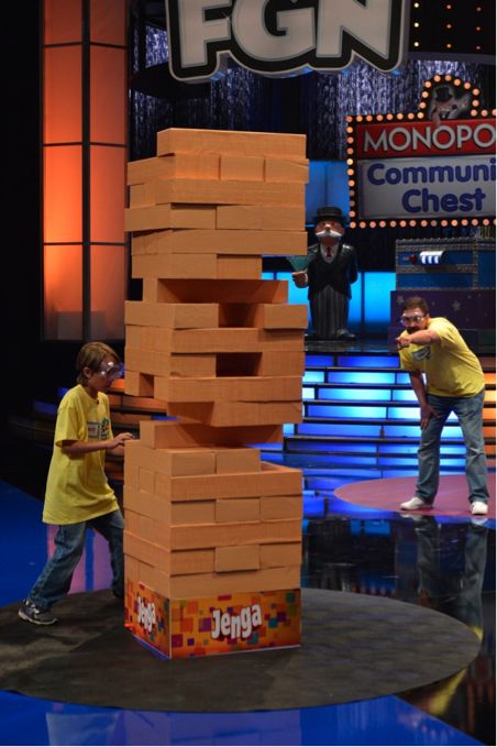 Jenga: This game of speed, strategy and dexterity has two families of three removing and stacking blocks on an oversized version of a life-sized version of ... Life Size Jenga, Giant Jenga Game, The Fifth Season, Church Fundraisers, Jenga Game, Giant Jenga, Stacking Blocks, New Games, New Kids On The Block