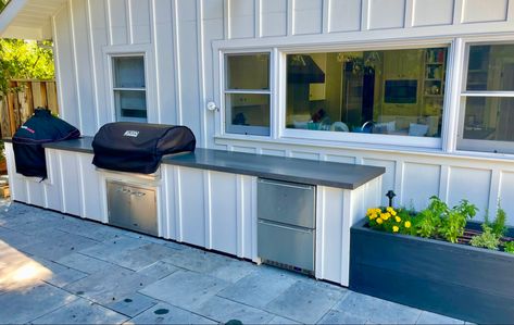 Includes gas grill, smoker and drawer fridge. Outdoor Kitchen Board And Batten, Hardie Board Outdoor Kitchen, Outdoor Kitchen Hardie Board, Outdoor Cabinetry, Kitchen With Stone, Farmhouse Outdoor Kitchen, Simple Outdoor Kitchen, Garden Board, Stella Rose