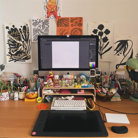 Check out Maylee Keo's desk setup equipped with a Wacom Intuos Pro, lots of pens and markers, photos, cute toys and cups! What do you keep around your desk? Click the link to choose a Wacom tablet of your very own! #wacom #wacomtablet deskgoals #workfromhome #homeoffice Desk Setup With Drawing Tablet, Digital Artist Desk Setup Aesthetic, Digital Art Setup Desk, Drawing Tablet Setup, Graphic Designer Desk Setup, Digital Artist Desk Setup, Digital Art Setup, Artist Desk Setup, Pastel Gamer