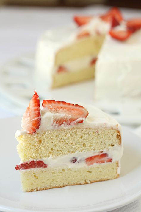 I had a wonderful strawberry cake while I was in Japan 13 years ago. It was so light and not too sweet. I've looked for recipes in the past, but I have finally figured out that I think it was a Japanese Strawberry Shortcake, or Christmas Cake. It is not like American shortcake, so it's worth a try if you are a fan of strawberry shortcake. Japanese Strawberry Shortcake, A Slice Of Cake, Asian Cake, Japanese Cake, Strawberry Shortcake Recipes, Slice Of Cake, Shortcake Recipe, Sponge Cake Recipes, A Piece Of Cake