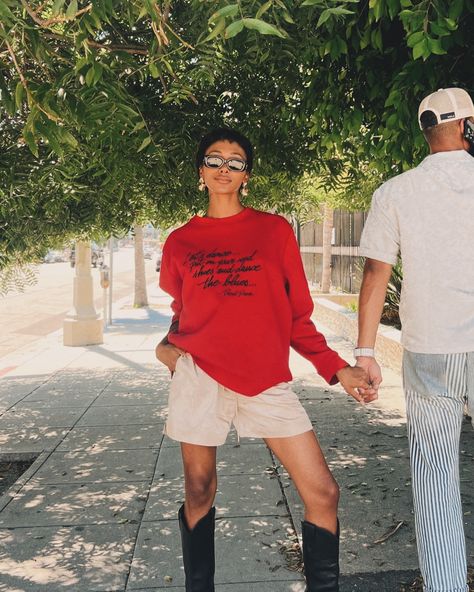 The chic combo we didn’t know we needed. EOR Nylon Shorts and Cowboy boots 🫱🏽‍🫲🏾 . . . . . @marissaaleyaa Street Wear Cowboy Boots, Cowboy Boot Shorts Outfit, Leather Shorts And Cowboy Boots, Denim Shorts And Boots Outfit, Jean Shorts And Cowboy Boots Outfit, Shorts Boots Outfit, Boots And Sweatpants, Fall Cowboy Boot Outfits, Western Ankle Boots Outfit