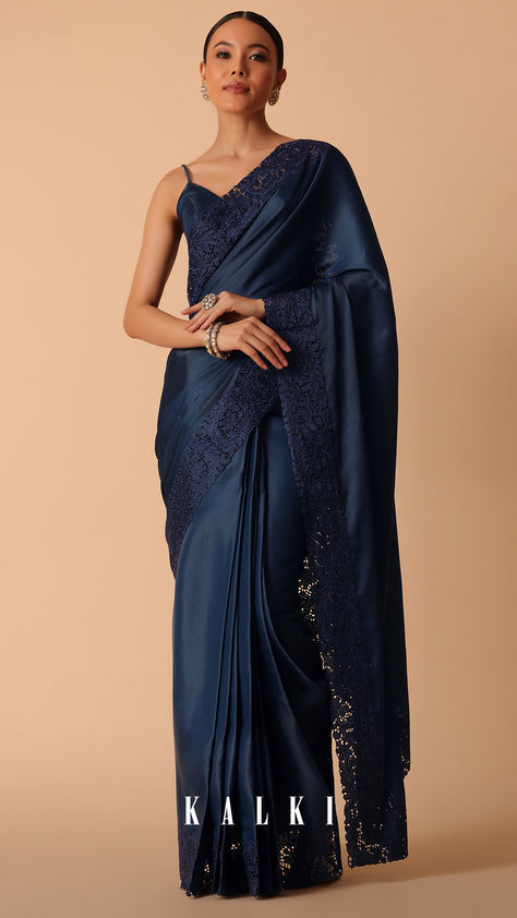 Perfect for stylish festive nights and special events, this solid saree comes decked in a striking navy blue color. Cut from rich organza fabric, it is elevated with exquisite lace trim border. Paired with an unstitched blouse piece, this beautiful drape will ensure you exude style and confidence. Bow Photoshoot, Blue Organza Saree, Solid Saree, Blue Sari, Sari India, Navy Blue Saree, Yumna Zaidi, Blue Organza, Female Dress