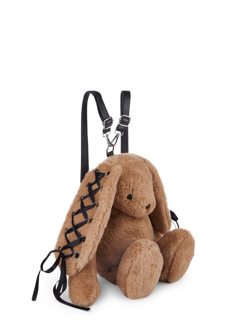 cuz ready for an adventure? This bunny plush backpack has a faux fur construction, a lace up ribbon design on the bunny ears, D-ring hardware, ear zip pockets, a back zippered pocket, embroidered detailing, and adjustable detachable vegan leather str Cool Mini Backpack, Bug Backpack, Stuffed Animal Purse, Rave Backpack, Cute Stuffies, Novelty Backpack, Stuffed Animal Bag, Stuffed Animal Backpack, Plushie Backpack