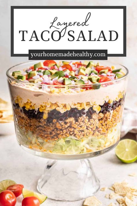 This quick and easy 30 Minute Layered Taco Salad is a simple weeknight meal. It's also beautifully layered and easily transportable, which makes it perfect for all of your summertime potlucks and football tailgates too. Your family is sure to love it! 7 Layer Taco Salad, Layer Taco Salad, Layered Taco Salad, Layered Taco Salads, Layered Taco, Mexican Salads, 7 Layer, Taco Salad, 7 Layers