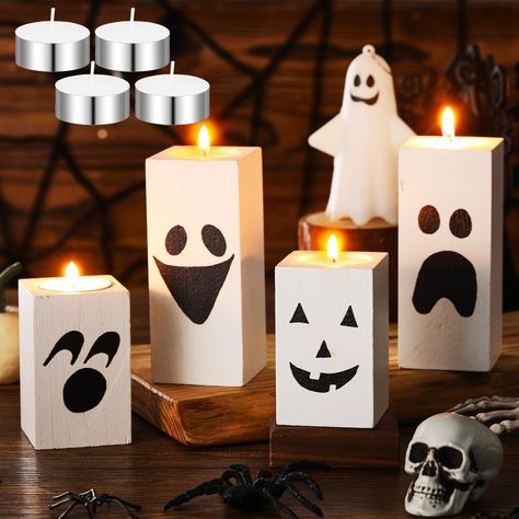 PRICES MAY VARY. Meet Your Needs: with every purchase, you don't just get the beautifully designed 4 Halloween tea light candle holders, but also 4 tea lights included in the package, each candle can burn for 8 hours,the comprehensive package makes it ready to use, enhancing your convenience, and you can share this set with your family or friends Halloween Design and Material: our Halloween tea light candle holders are constructed from quality wood, giving it durability and longevity, The outer Halloween Ghost Table Decorations, Halloween Birthday Centerpieces, Ghost Candle Holder, Halloween Table Decorations Centerpieces, Wooden Halloween Decorations, Table Decor Halloween, Candles Halloween, Halloween Table Settings, Halloween Table Decor