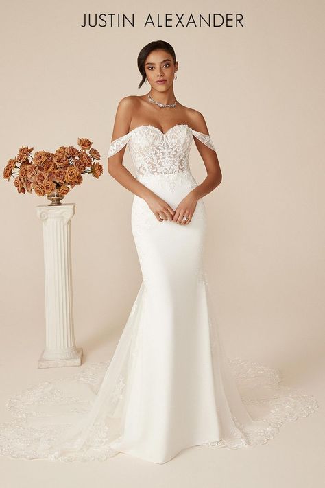 Look timeless in this figure flattering fit and flare wedding dress. It features a classic sweetheart neckline with an illusion bodice that is detailed with beaded lace appliqués that continue onto the stretch crepe skirt. The appliqués continue down to form a stunning scalloped edge tulle train that is going to be your wow moment as you walk down the aisle. It's paired with matching detachable off the shoulder straps to create a two-in-one look. Justin Alexander Bridal, Justin Alexander Wedding Dress, Blush Bridal, Justin Alexander, Fit And Flare Wedding Dress, White Wedding Dress, Wedding Dress Pictures, Lace Wedding Dress, Wedding Dress Shopping