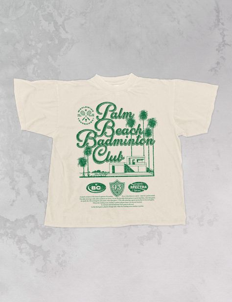 Join the Palm Beach Badminton Club in this vintage style oversized sweatshirt! - Features Palm Beach Badminton Club with 93 in a crest underneath and a description of the sport below it all in a green ink - Screen print transfer that is heat pressed onto each tshirt - Tshirt is a super soft vintage wash that gets softer after each wash - Oversized fit - Sizing translation: XS/S = L , S/M = XL , L/XL = 2XL , 2XL/3XL = 3XL - 100% Cotton - Model is 5'9 wearing a size 2XL/3XL **due to screens & filters color may vary from pictures** Beach Design Graphic, Retro Shirts Vintage Graphic Tees, Club Tshirt Designs, Vintage T-shirt, Beach Badminton, Club Shirt Designs, Japanese Tshirt Design, Style Oversized Sweatshirt, Sports Shirt Design