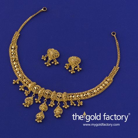 A midi-necklace that showcases katai, ball and wire-work in equal measure and does justice to each by balancing them beautifully to create a design of rare import in an ornament so light in weight. With matched eartops, all in hallmarked 22K gold. Necklace: 12 gm, price Rs. 35,200/- Earring: 3 gm price Rs. 8800/- Light Weight Gold Necklace Set Indian, Gold Necklace Light Weight Designs, Gold Necklace Set Simple With Price, Light Weight Gold Necklace Indian, 30 Gms Gold Necklace Set, Necklace Set Gold Wedding Jewelry, 20gms Gold Necklace Designs, Gold Necklace Set Design, Light Gold Necklace