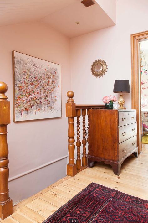 The Pink House hallway with Farrow & Ball Pink Ground walls and painting by graffiti artist Dale vN Marshall Pink Hallway, Setting Plaster, Hallway Ideas Diy, The Pink House, Pink Ground, Hallway Wallpaper, Under Stairs Cupboard, Hallway Flooring, Farrow And Ball