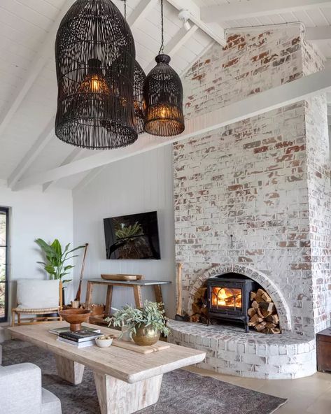 19 Painted Fireplace Ideas for a Cozy, Modern Update Exposed Brick Fireplaces, Whitewashed Brick, German Schmear, White Wash Brick Fireplace, Fireplace Stove, Painted Brick Fireplace, Interior Brick, Brick Interior Wall, Brick Interior