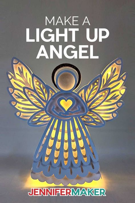 Light up paper angel on a background with lights off Angel Svg Free, Cricut Angel, Angel Quilling, Diy Tree Topper, Diy Angels, Paper Angel, Cricut Christmas Ideas, Angel Crafts, 3d Light