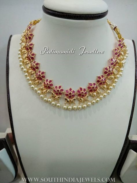 Gorgeous 22k gold ruby necklace embellished with pearls. For inquiries please contact the seller below. Seller Name : Pulimamidi Jewellers Facebook : https://www.facebook.com/pulimamidijewellers/ Contact No : 098853 19029 Related PostsGold Ruby Guttapusalu Necklace from PSJ60 Grams Gold Necklace DesignDiamond Ruby Necklace Set from Rakesh Jewellers110 Grams Gold Necklace Design160 Grams Gold Neclace With Krishna PendantGold … Ruby With Pearl Necklace, Kempulu Pachalu Necklace, Pulimamidi Jewellers, Ruby Necklace Set, 20 Grams Gold Necklace Designs, Gold Necklace Set 20 Grams, 20grams Gold Necklace Designs, Light Weight Gold Necklace, Ruby Necklace Designs