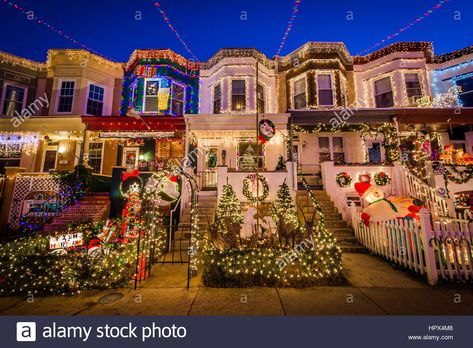 Download this stock image: The Miracle on 34th Street Christmas lights at night, in Hampden, Baltimore, Maryland. - HPX4M8 from Alamy's library of millions of high resolution stock photos, illustrations and vectors. Hampden Baltimore, Christmas Lights At Night, Zoo Lights, Wooden Hut, Lights At Night, Miracle On 34th Street, Holiday Train, Christmas Light Displays, Christmas Tours