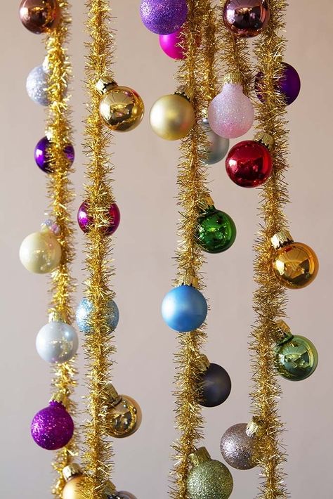 Rainbow Baubles & Tinsel Garland - View All Christmas - Christmas Rainbow Baubles, Christmas Activation, Christmas Photobooth, December Decor, Scream Christmas, Tinsel Christmas Tree, Kitsch Christmas, Christmas Tinsel, 1950s Christmas