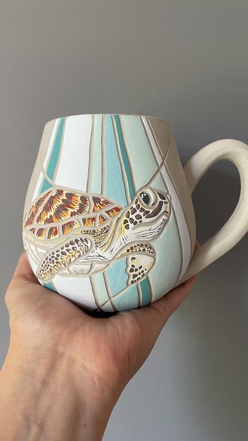 ceramics | creativeartworksblog Turtle Pottery Ideas, Sea Turtle Ceramics, Ceramic Sea Turtle, Ocean Themed Pottery, Cool Mugs Ceramics, Sea Turtle Crafts, Ceramic Art Projects, Ocean Ceramics, Turtle Cup