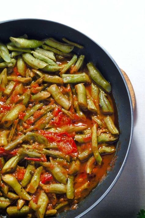 This Bill Miller Green Bean Recipe is the ideal side dish because it's quick and easy to make. Fresh garlic, juicy tomatoes, and tender green beans combine to Green Bean With Tomatoes Recipes, Green Bean Recipes Tomatoes, Green Bean And Tomatoes Recipes, Bill Miller Green Beans Recipe, Bill Millers Green Beans Recipe, Green Beans With Tomatoes, Beans Crockpot, Beans Recipe Crockpot, Green Bean Recipe