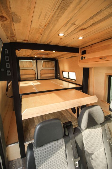 Our most recently completed build, "Clean Slate" has a bed that comes down from the ceiling, with an extension! Check out more photos of this build on the project gallery of our website. #van #vanlife #vanconversion #convertedvan #freedomvans #sprinter #sprintervan #sprinter144 #sprinterconversion #convertedsprinter #electricbed #woodwork #bellingham #vanconversioncompany 144 Sprinter Van Conversion, Sprinter Van Camper, Laminate Plank Flooring, Camper Beds, Van Bed, Bed Lifts, Transit Camper, Sprinter Van Conversion, Van Conversion Interior