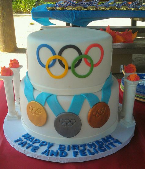 Olympics Cake. Google Image. Olympic Desserts, Rio Party, Olympic Theme Party, Olympic Theme, Gymnastics Party, Olympic Party, Sport Cakes, Themed Birthday Cakes, Special Occasion Cakes