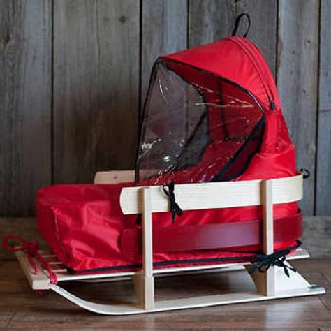 Classic Wooden Deluxe Baby Sled with Cushion and Windshield - Comfortable Back Rest, Reinforcement on the Back of the Skis with Red Polypropylene Cord, Brass Chain Detailing and Clear Coated Finish : Amazon.ca: Sports & Outdoors Baby Sled, Baby Snow, Snow Sled, Baby In Snow, Snow Blowers, Luge, Baby Cover, Feb 7, Temporarily Unavailable