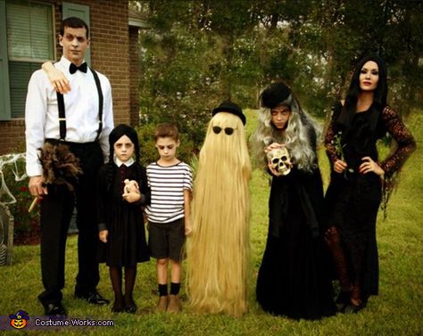 Brooke: My family and I dressed as the Addams family from the popular 90's films. I am Morticia, my husband as Lurch ( with a cameo from Thing). My oldest daughter... Creative Group Halloween Costumes, Addams Family Costume, Adams Family Costume, Addams Family Halloween Costumes, The Addams Family Halloween, Anime Festival, Diy Group Halloween Costumes, Addams Familie, Addams Family Costumes