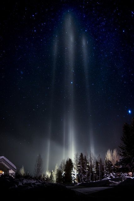 Light Pillars a Million-Mirror Optical Illusion on Winter Nights Cirrostratus Clouds, Light Pillars, Wyoming Mountains, Optical Phenomena, Sun Valley Idaho, Today Images, Closer To The Sun, Atmospheric Phenomenon, Ice Crystals