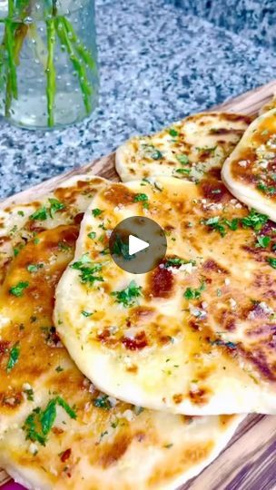 196 reactions · 34 shares | Garlic Naan: Yeast mixture:
3 tsp yeast
1 tsp sugar
2 Tbsp water
*Rest for 10 minutes*
3 cups flour
1/2 tsp salt
1/3 cup yogurt
1/4 cup olive oil
2/3 cup warm milk
Add yeast mixture Knead, rest, make dough balls
Add mozzarella cheese in center Roll and pan fry
Use half stick melted butter 
3 cloves chopped FRESH garlic Chopped cilantro to top naan with
Save this video for later 💕#garlicnaanbread #naan | Lindsey Brown | lindseybcookin · Original audio Garlic Naan, Pan Fry, Biscuit Bread, Breads & Buns, Naan Bread, Dough Balls, Yogurt Cups, Warm Milk, Fresh Garlic