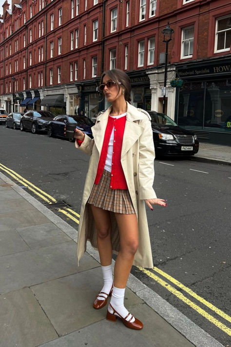 @keziacook is wearing Sézane Gaspard red knit cardigan and Paula babies with socks. The beige trench, white t-shirt and short checked skirt are personal pieces. Nordic Outfit, Sezane Gaspard, Knitted Dress Outfit, Preppy Summer Outfits, Red Cardigan, Chic Outfit, How To Pose, Autumn Outfit, Outfit Inspo Fall