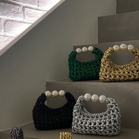 Leather effect bags 🤍 •Lining •Leather effect •Material: Polyester •Acrylic pearls •Metallic Colors: black, gold, silver, anthra... Bags Handles Ideas, Crochet Purse With Beads, Black Bag Crochet, Metallic Crochet Bag, Silver Crochet Bag, Crochet Leather Bag, Crochet With Pearls, Crochet Bag Accessories, One Handle Bag