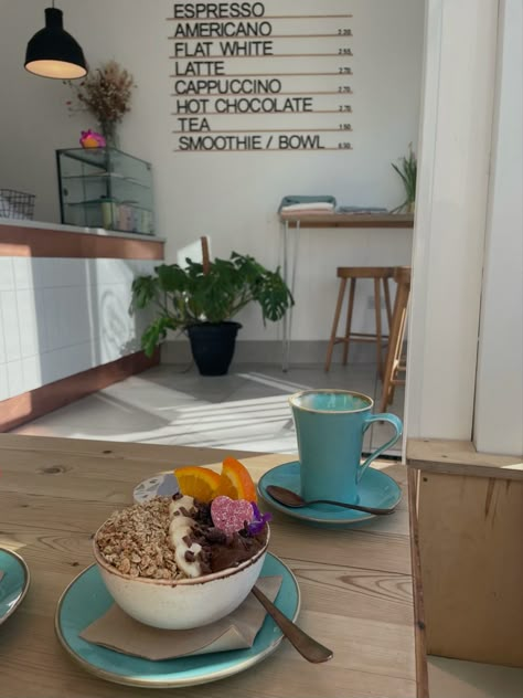 A smoothie bowl & coffee in a coffee shop in Cornwall Coastal Coffee Shop Aesthetic, Rustic Coffee Shop Aesthetic, Smoothie Bowl Shop, Preppy Cafe, Acai Bowl Shop, Smoothie Shop Aesthetic, Vegan Coffee Shop, Nat Aesthetic, Beach Coffee Shop