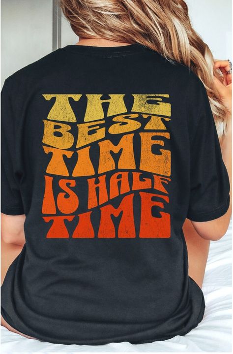 Band life ...  The Best Time Is Half Time.  This shirt applauds the hard work of the marching band.  It's fun for a band member, a band parent, or give it as a gift to a band mom or dad.  The design is on the back of the tee.  Size up for an oversized look.  GILDAN 5000 UNISEX TEE  *100% cotton *Machine wash in cold with similar colors, tumble-dry on low *Loose fit, runs true to size, size up for oversized look SIZES   (See the size chart in the photos)    S:    18" chest, 28" length    M:  20" chest, 29" length    L:    22" chest,30" length    XL:  24" chest, 31" length   2XL: 26" chest, 32" length   3XL: 28" chest, 33" length   4XL: 30" chest, 34" length   5XL: 32" chest, 35" length PROCESSING  *2-5 business days, usually sooner *Order before December 8th for delivery by Christmas SHIPPI Marching Band Parent, Band Booster Shirts, I’m With The Band Shirt, Marching Band Shirt Designs, Band Parent Shirts Ideas, Band Mom Shirts Ideas, School Band Shirts, Band Shirt Ideas, Color Guard Mom