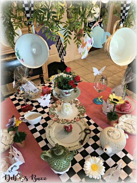 alice-in-wonderland-table-teacup-chandelier-overhead Devonshire Tea, Gift Table Ideas, Party Chandelier, Alice In Wonderland Table, Summer Tea Party, Alice In Wonderland Gifts, Alice In Wonderland Tea Party Birthday, Favorite Things Party, Table Centerpieces Diy