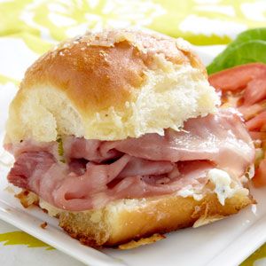 sassy tailgate sandwiches ~  1 pkg. (12 count) Hawaiian bread rolls  1 lb. shaved Black Forest ham  12 slices Gruyere cheese  1 tub (8 oz.) Philadelphia® Chive & Onion Cheese Spread  1/2 cup butter, melted  1 Tbsp. Worcestershire sauce  1/2 Tbsp. dried minced onion  1/4 cup grated Parmesan cheese Tailgate Sandwiches, Hawaiian Bread Rolls, Hawaiian Bread, Recipe Girl, Tailgate Food, Gruyere Cheese, Cheese Spread, Football Food, Minced Onion