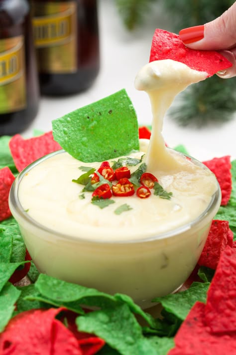 Our Christmas Queso Will Melt Your Heart  - Delish.com Christmas Queso, Creative Christmas Appetizers, Christmas Party Dips, Christmas Eve Appetizers, Holiday Party Appetizers, Christmas Appetizers Easy, Party Dip Recipes, Christmas Cheese, Christmas Appetizers Party