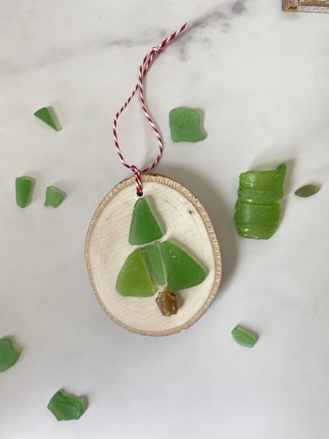 Learn how to make sea glass Christmas trees and ornaments with these easy step-by-step tutorials. Sea glass crafts are a great way to use up the beach glass you've collected from your favorite beaches. Come learn how! How To Make A Sea Glass Christmas Tree, Diy Sea Glass Ornaments, Seaglass Christmas Ornaments, Sea Glass Ornaments Diy, Sea Glass Christmas Trees, Eco Christmas Decorations, Glass Ornaments Diy, Seaglass Christmas, Glass Christmas Trees