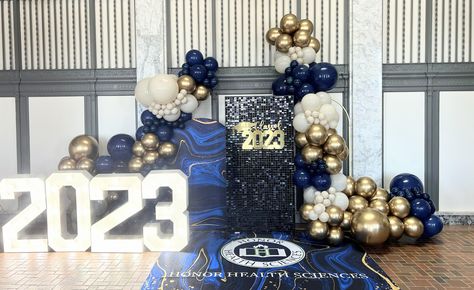 Blue, gold and nude balloon garland, 2023 Marquee numbers and black shimmer wall. Black Shimmer Wall, Light Up Numbers, Marquee Numbers, Shimmer Wall, Balloon Decor, Gold Balloons, Balloon Arch, Balloon Garland, Blue And Gold