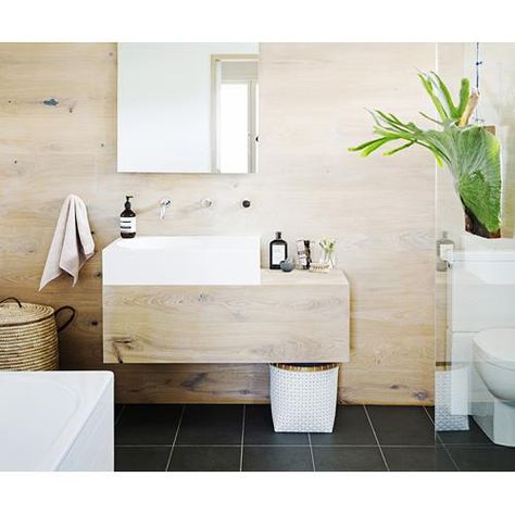 Find out how designers and brands are helping homeowners create more eco-friendly bathrooms. Beach House Stairs, Lux Bathroom, Eco Bathroom, 60s House, Luxe Bathroom, Black Floor Tiles, Timber Shelves, Old Bathroom, Bathroom Design Luxury