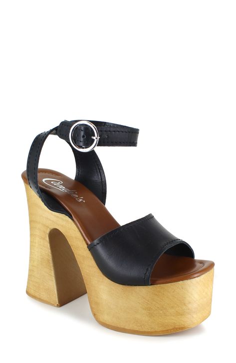 An ankle-strap sandal made from smooth leather offers bold retro vibes with a sculptural woodgrain platform and sky-high block heel. 4" heel; 1 1/2" platform Adjustable ankle strap with buckle closure Leather upper and lining/synthetic sole Imported Wooden Heels, Wooden Heel, Fabulous Shoes, Hot Shoes, Sky High, Sandal Women, Ankle Strap Sandals, Strap Sandals, Cute Shoes