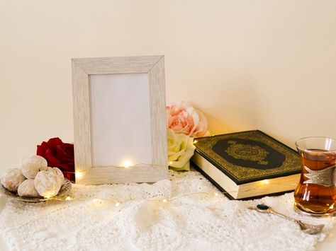 Top view of a man holding quran | Free Photo Frame Mockup Free, Blank Frames, Blank Picture, Quran Teaching, Save The Date Pictures, Interior Poster, Baby Logo Design, Wedding Frame Gift, Save The Date Video