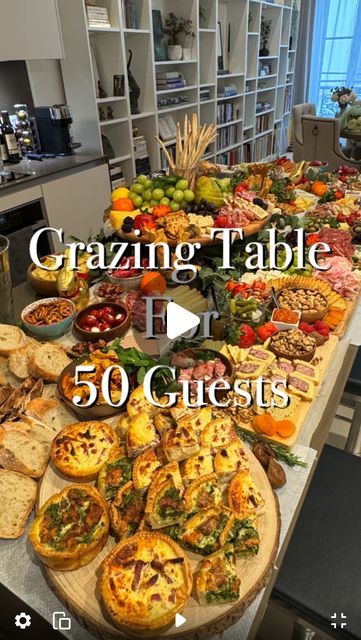 Toni Scaglione on Instagram: "Grazing table for large groups 🫒🧀🥂🍷  Make your life easier, everyone can serve themselves and you can enjoy the party 🎉   #grazingtables #grazingboard #charcuterie #charcuterieboard #cheese #fromage #wine #champagne #party #partyideas #homeparty #easypartyfood #partyfood #partyfoodideas #houseparty" Buffet Food Ideas Decor, Large Serving Table, Charcuterie Table With Flowers, Appetizers Table For Party, Snack Grazing Board, Giant Charcuterie Board Wedding, Setting Up A Grazing Table, Feeding A Large Crowd, Hot Food Grazing Table Ideas