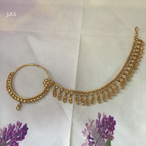 High quality Indian handmade gold plated nose ring studded with kundan and CZ stones attached with single string with detail work. Nose ring hangs gently from the side of your nose and does not required a piercing. Beautiful nath for Indian and Pakistani bridal. Nose Ring Diameter: L x 7 cm / W x 6.5 cm Stone Colour: Champagne Pahadi Nath Bridal, Pahadi Jewellery, Bengali Bridal Jewellery, Traditional Nose Ring, Nose Ring Chain, Nath Design, Nath Bridal, Bridal Nath, Grid Ideas