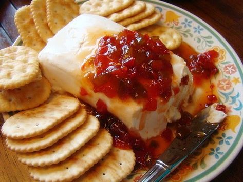 Perhaps the easiest of all appetizers is the cream cheese block. We typically do one sweet and one savory option. Take an entire block of cream cheese (reduced fat is an easy substitute here) and place it in the middle of a plate. Easy Cream Cheese Appetizers, Cheese Block, Cheese Dips, Cream Cheese Appetizer, Homemade Ham, Vidalia Onion, Cheese Appetizer, Hot Pepper Jelly, Pepper Recipes