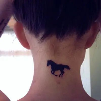 15 Spectacular Horse Tattoos and Their Symbolic Meanings - The Paws Equine Tattoo, Small Horse Tattoo, Music Skull, Horse Tattoos, Horse Shoe Tattoo, Horse Tattoo Design, Cowgirl Tattoos, Shoe Tattoos, Girl Horse