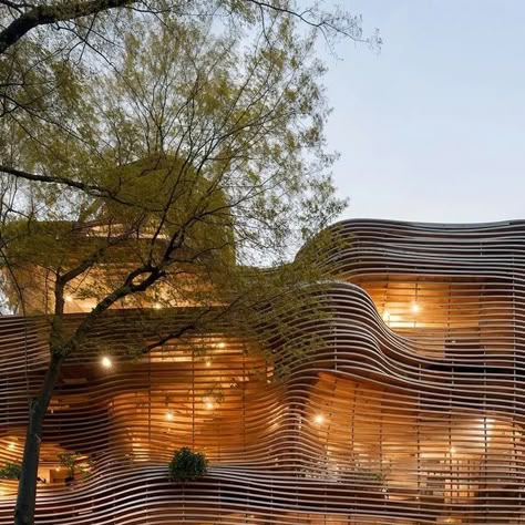 Architecture Sight on Instagram: "#architecturesight⁣ Lattice Wood facades for a Bookstore in Shirokane neighbourhood of Tokyo⁣ ⁣ In this conceptual idea, we tried to obtain a harmonious blend of traditional craftsmanship with contemporary design sensibilities. ⁣ ⁣ Reminiscent of traditional Japanese carpentry techniques and the use of scrap wood for the facade provides an aesthetically pleasing texture and also demonstrates a sustainable approach to building materials. ⁣ ⁣ Inside the bookstore, we emphasized a continuous flow of wooden lattices that create shelves and seatings. ⁣ ⁣ This approach hopefully fosters a sense of warmth and natural ambiance.⁣ by @syntheticarchitecture ⁣ Make sure you are following @architecturesight come to your best references, in Architecture, interior design Japanese Zen Architecture, Korean Architecture Traditional, Harmonious Architecture, Japanese Lattice, Japanese Facade, Create Shelves, Japanese Carpentry, Layered Architecture, Art Retreat