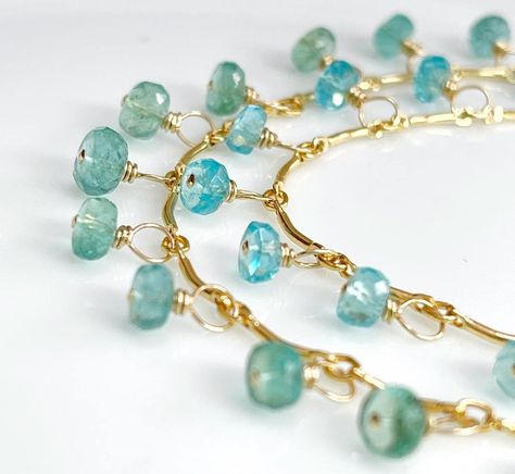 "**THIS LISTING IS FOR ONE BRACELET. Please select Emerald (light green) or Apatite (Caribbean blue - last four photos) in the drop down menu.** These beauties feature AAA Caribbean Blue Apatite, and the other AAA Zambian Emeralds. They look amazing on this gold filled chain, which has been one of my favorites for necklaces. Each gemstone has been meticulously hand wrapped with 14k Gold Filled wire. The hook & eye clasps are hand forged by me. Length of each bracelet is approximately 6 7/8 i Chip Jewelry, Emerald Bracelet, Caribbean Blue, Zambian Emerald, Crystal Beads Bracelet, Bracelet Ideas, Blue Apatite, Unique Bracelets, 925 Silver Jewelry