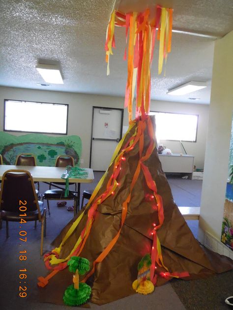 Volcano Vbs Decorations, Large Volcano Prop, Volcano Room Transformation, Moana Hallway Decorations, Volcano Party Decoration, Volcano Decoration Party Ideas, Dinosaur Vacation Bible School, Diy Volcano Decoration, Cardboard Volcano