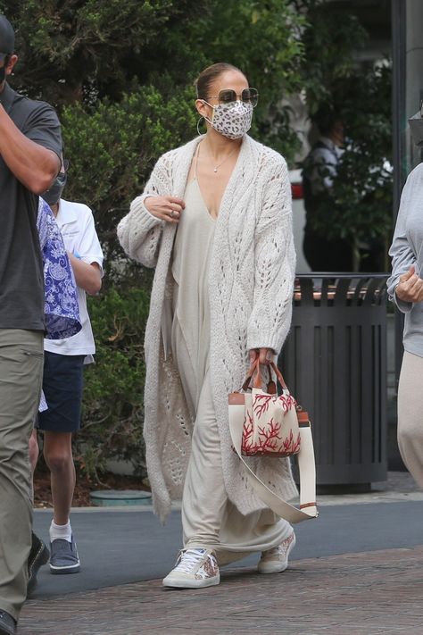 Jennifer Lopez Wore an Unexpected $4,000 Fall Cardigan With Confusing Sneakers Long Dress And Cardigan Outfit, Crochet Cardigan Outfit Summer, Long Cardigan Outfit Summer, Long Knit Cardigan Outfit, Fall Celebrity Outfits, Long Dress With Cardigan, Summer Dress With Cardigan, How To Wear A Long Cardigan, Giselle Aesthetic