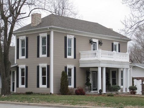 Traditional home with taupe paint, white trim and black shutters Taupe House, Exterior House Paint Color, Paint Colors For House, Colors For House, Exterior House Siding, Paint Color Combinations, Exterior House Paint, Best Exterior Paint, House Paint Color Combination