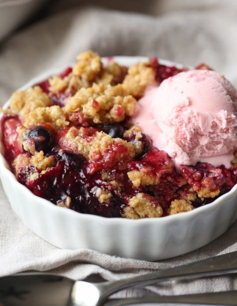 This Berry Crisp Recipe is a classic, foolproof EASY mixed berry dessert. Sweet, tart berries are layered underneath a buttery, crunchy topping. Perfect with a scoop of ice cream or all on its own. #cookiesandcups #berrycrisp #berrycrumble #strawberryrecipe #blueberryrecipe #summerberries #berryrecipe Haskap Berry, Mixed Berry Dessert, Mixed Berry Crisp, Berry Crisp Recipe, Apple Fritter Cake, Blueberry Crumble Bars, Berry Crisp, Berry Crumble, Oatmeal Cookies Chewy