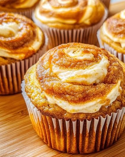 Pumpkin Swirl Muffins - SavorySplash Pumpkin Swirl Muffins, Thanksgiving Themed Food, Fall Themed Food, Cream Cheese Swirl Muffins, Autumn Cupcakes, Fall Themed Desserts, Autumn Sweets, Blueberry Cheesecake Cookies, Swirl Muffins