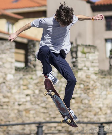 What is a Kickflip? (with pictures) Skateboarding Poses, Athletic Poses, Sports Reference, Quest Board, Sketching Reference, Poses Male, Male Pose, Skateboard Photography, Action Pose Reference